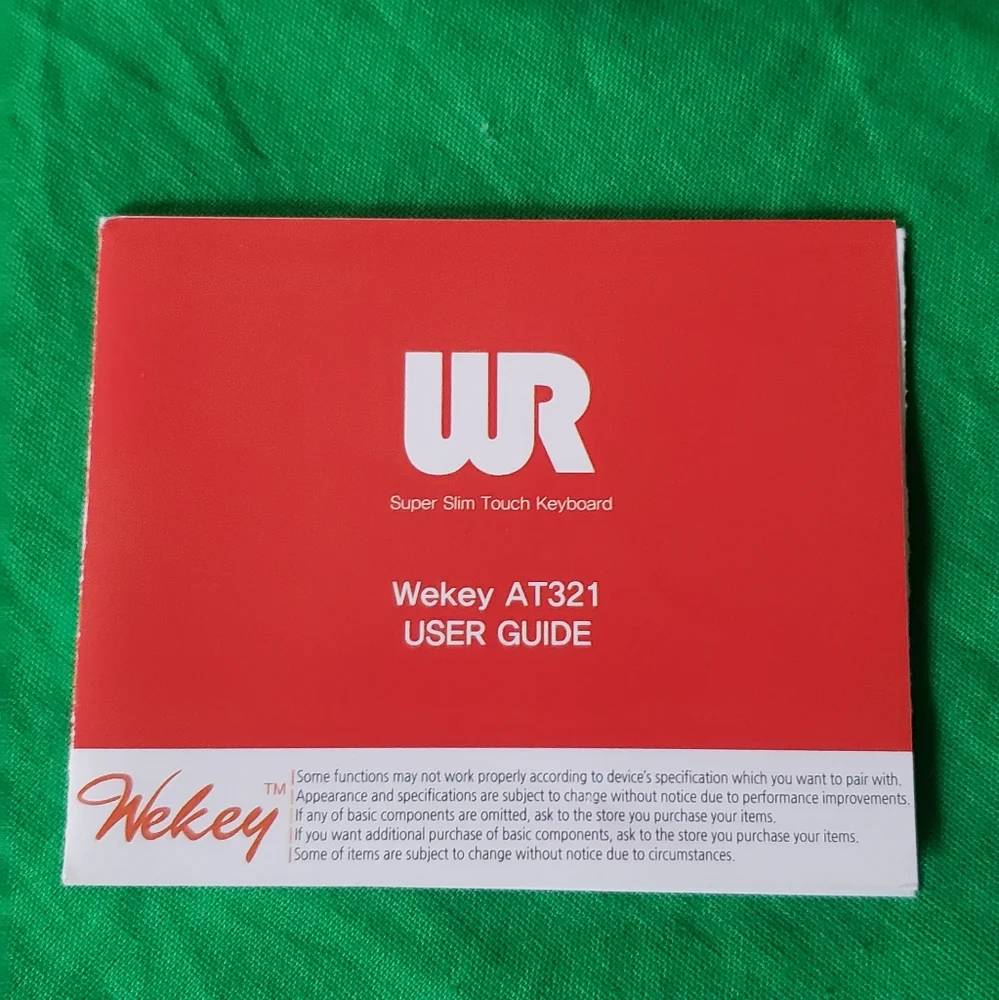 Wekey Bluetooth Super Slim Touch Keyboard with Leather Case USB Cable Manual